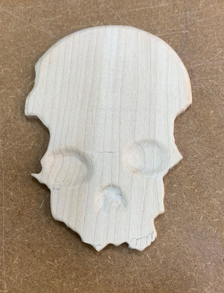 wood carving a skull